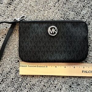 Michael Kors Elegant Black wristlet.